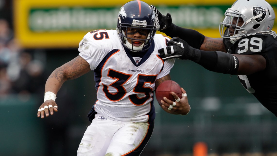 Denver Broncos running back Lance Ball runs a drill during