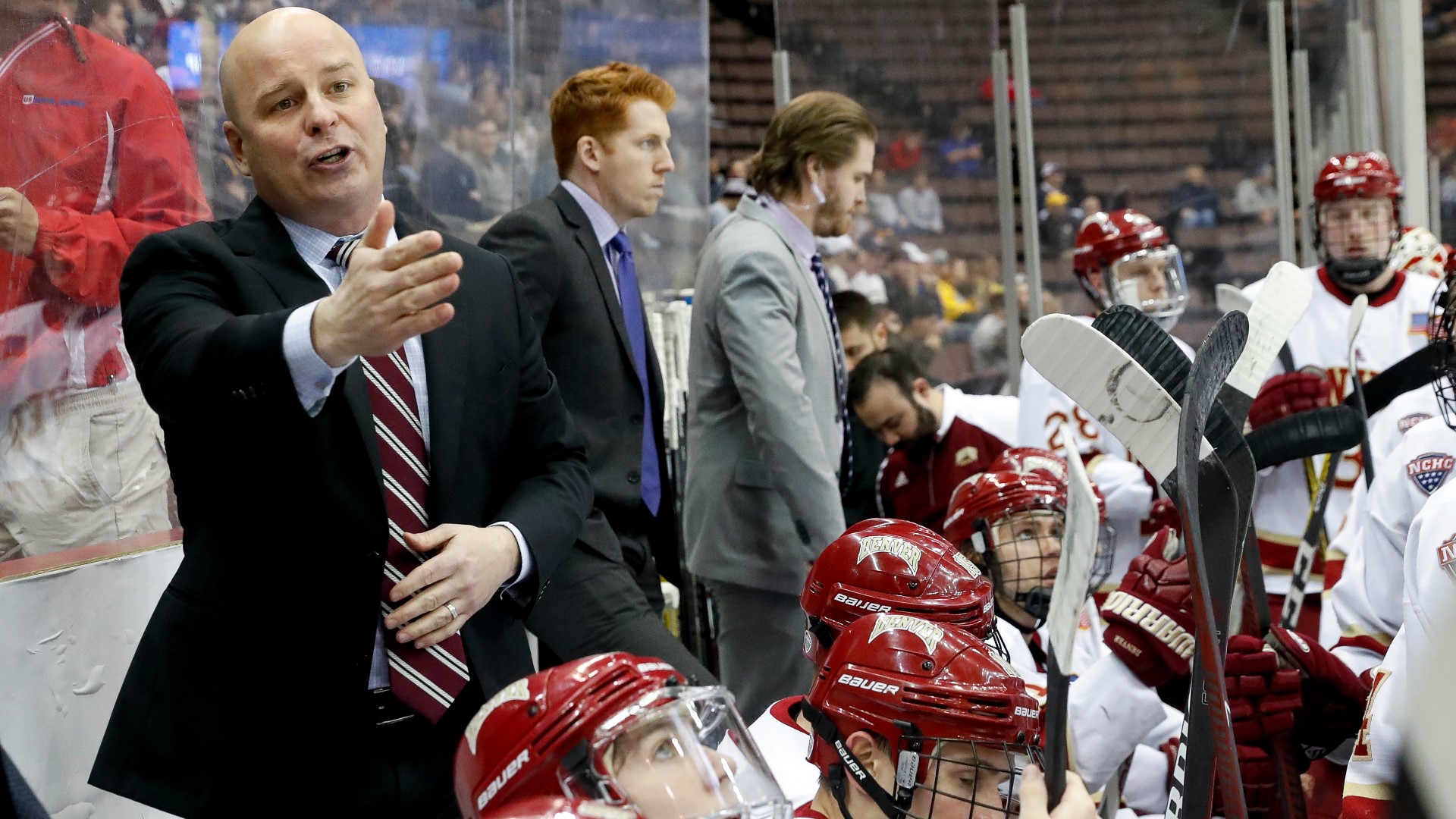 Jim Montgomery, the former head coach of the Denver Pioneers, has led the Boston Bruins to a record-setting campaign.