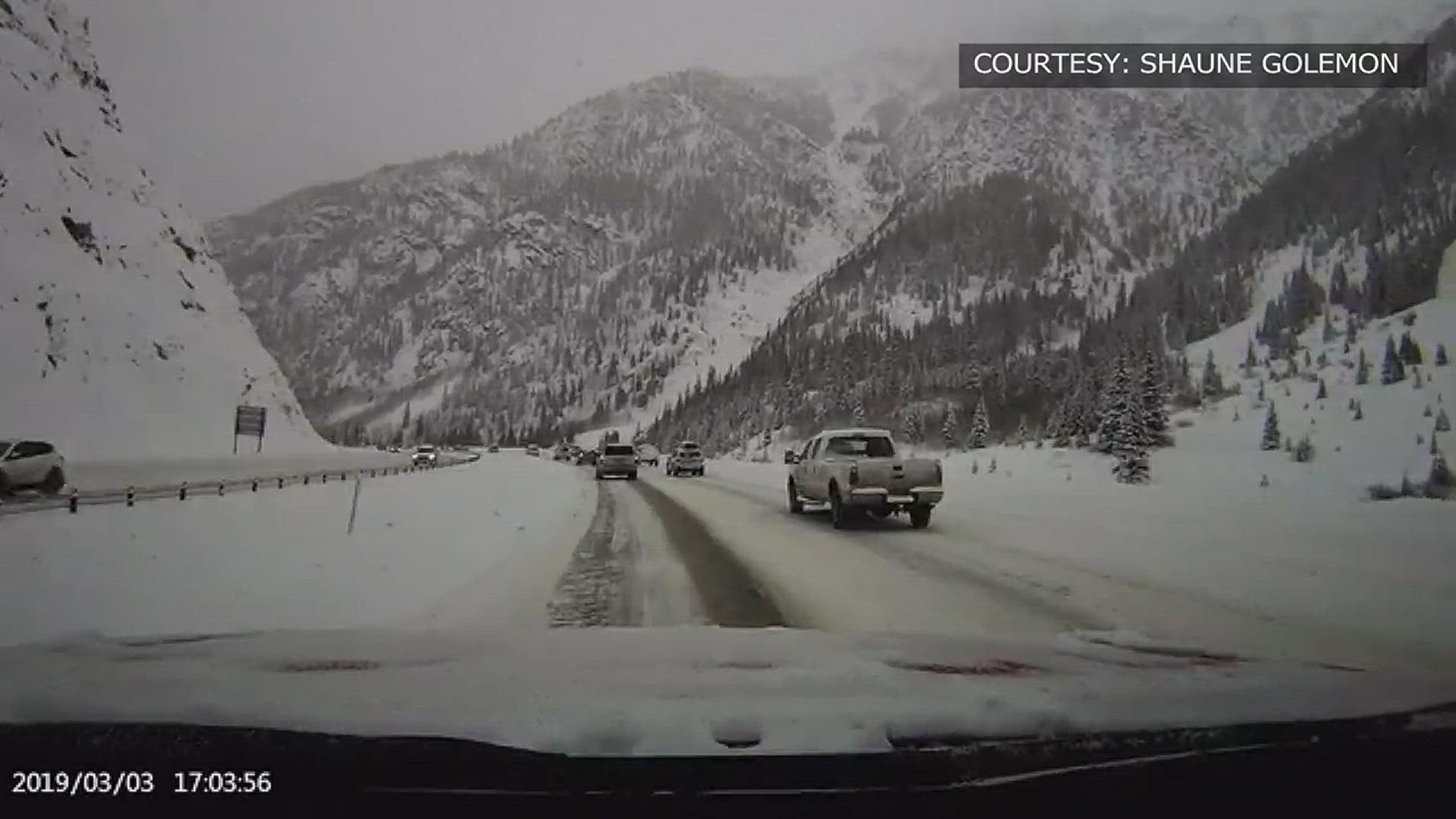 Video from a dash camera shows an avalanche slamming into a vehicle on I-70 around 5 p.m. on Sunday. The driver says they were pushed off the roadway and into the median.