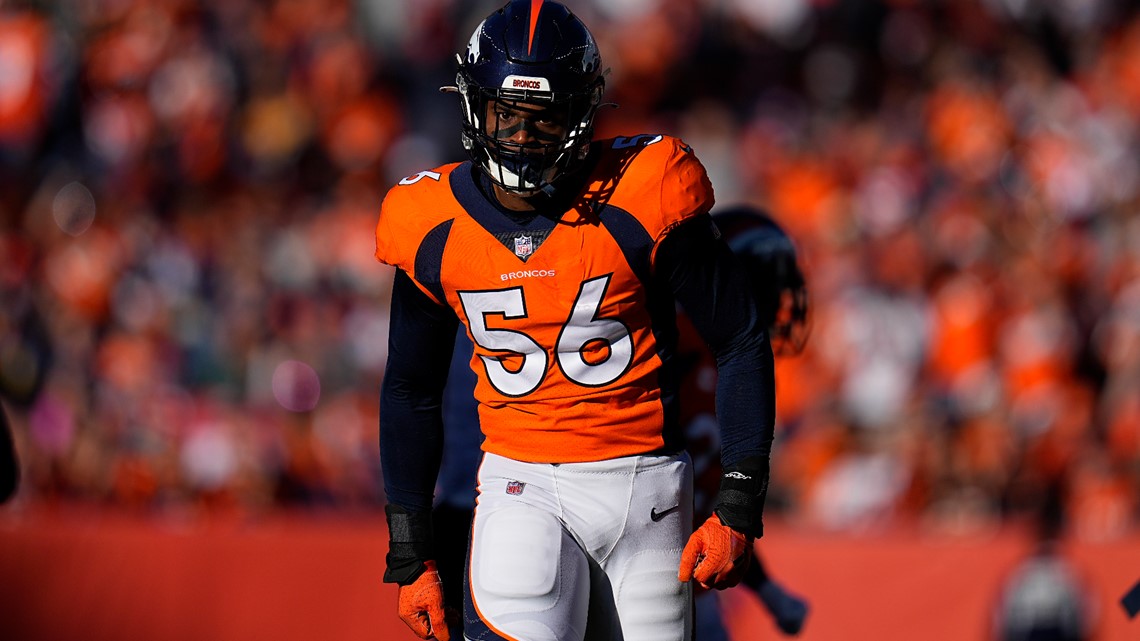 Denver Broncos linebacker Baron Browning (56) runs a play against