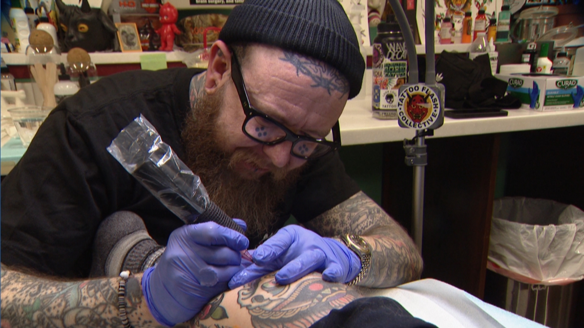 Denver tattoo artist finds strength at shop after losing home to fire