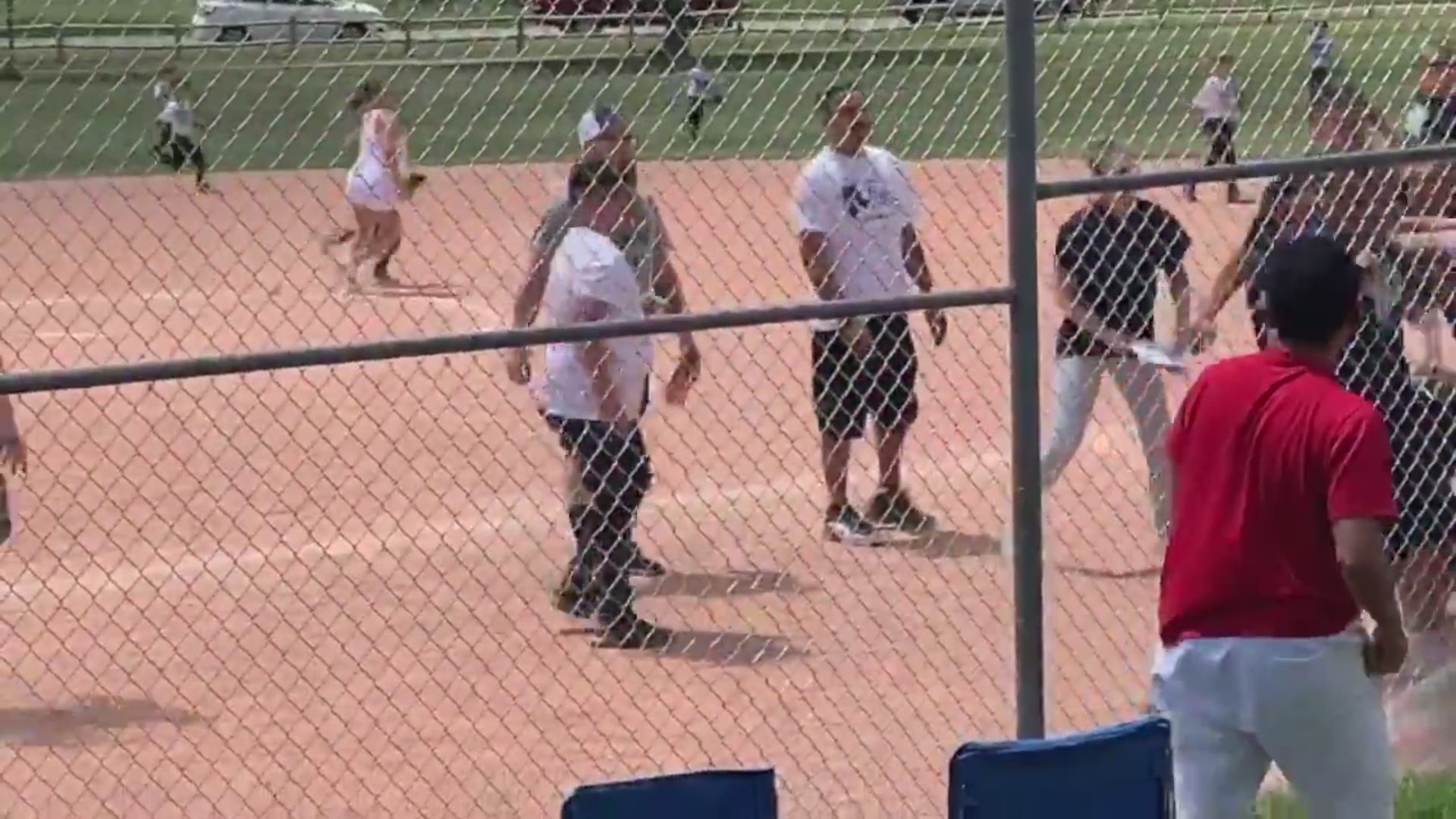 The Lakewood Police Department in Colorado released video of a fight that broke out at a baseball game involving 7 year olds at Westgate Elementary School.