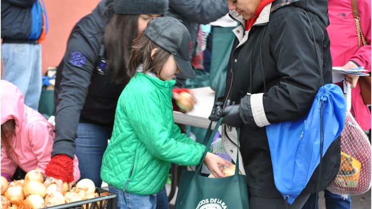 Servicios de la Raza giving away Thanksgiving turkeys, food boxes
