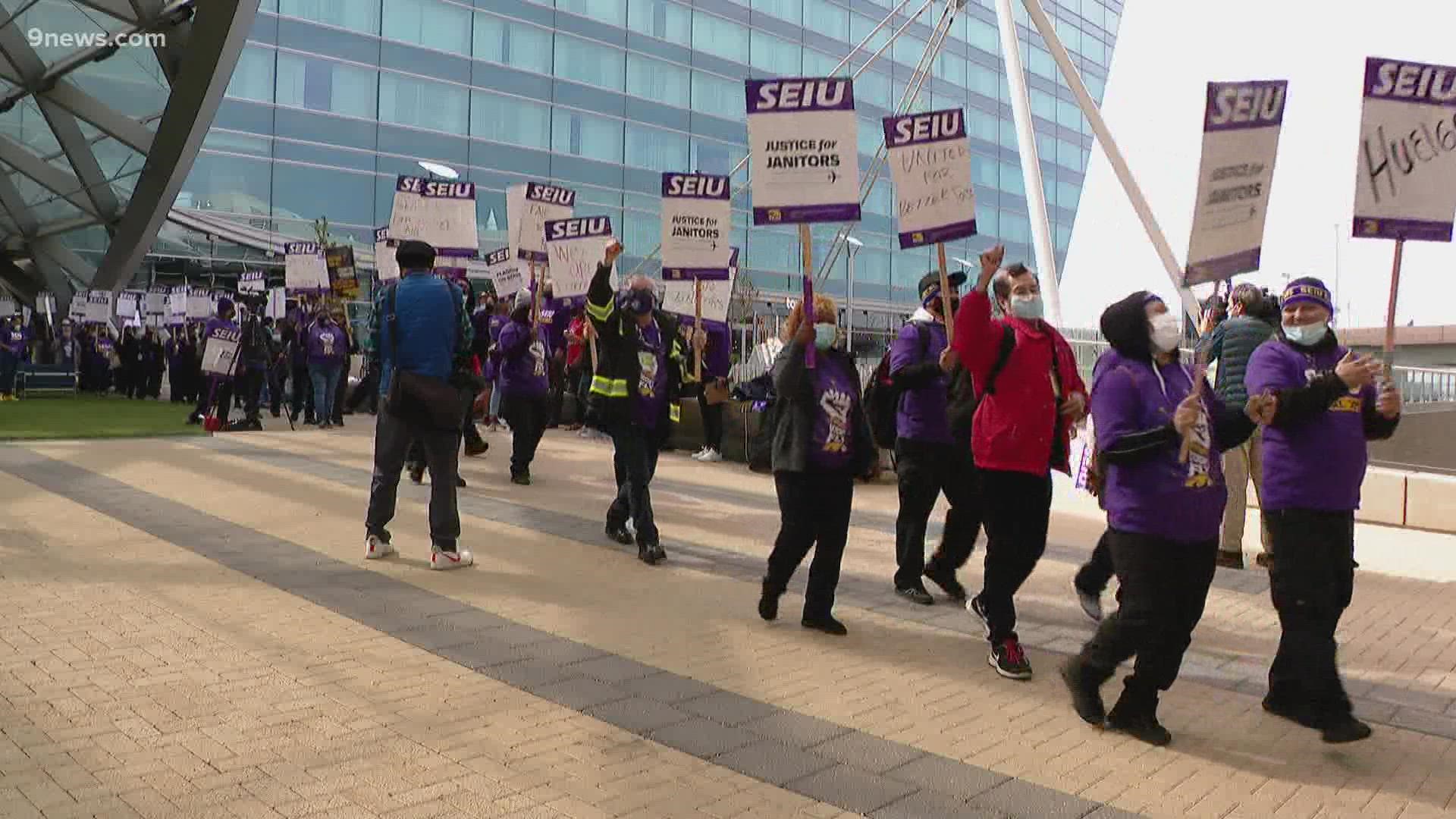 About 350 airport janitors walked off the job Friday, the Service Employees International Union said.