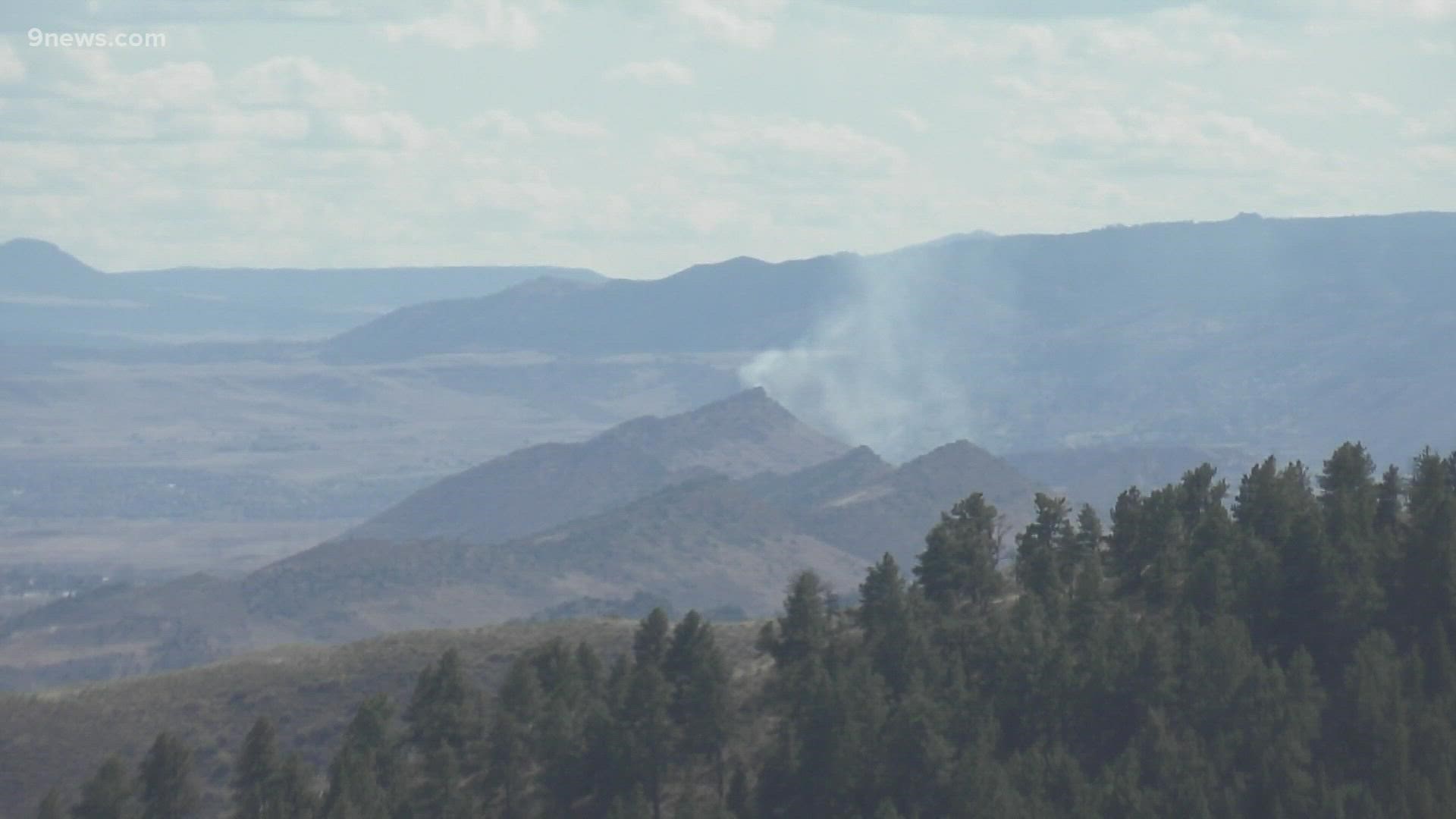 The fire was burning on the Lockheed Martin property, west of the hog back, South Metro Fire Rescue said on Sunday.