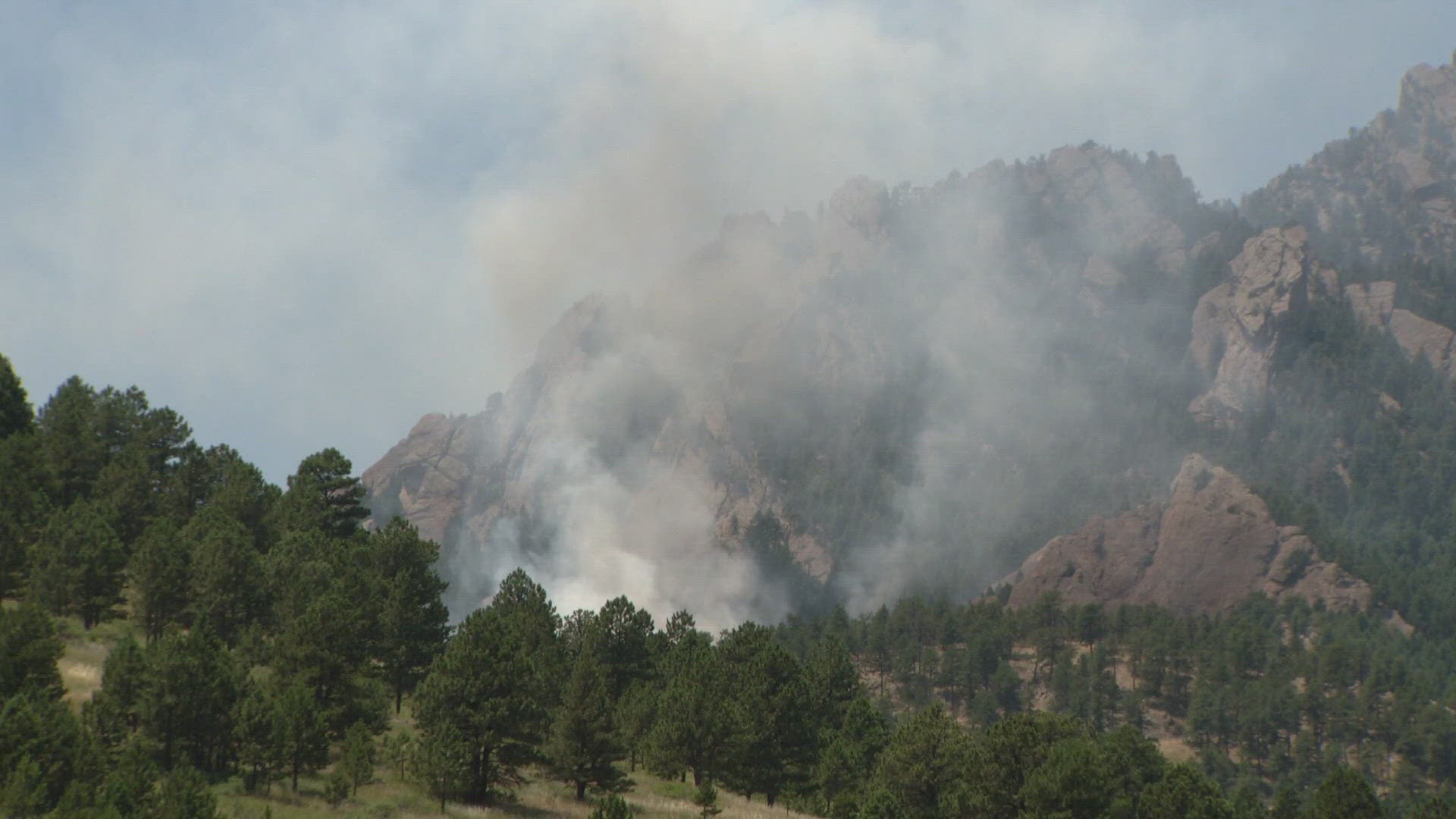 Crews responded to a wildland fire in the area of the National Center for Atmospheric Research Lab southwest of Boulder on Friday.
