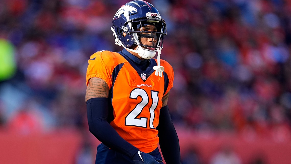 Denver Broncos cornerback Pat Surtain II autographs a jersey before the  Broncos host the Las Vegas Raiders in an NFL football game, Sunday, Sept. 10,  2023, in Denver. (AP Photo/David Zalubowski Stock