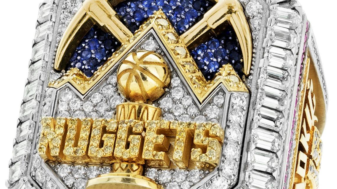 Denver Nuggets receive championship rings, raise banner