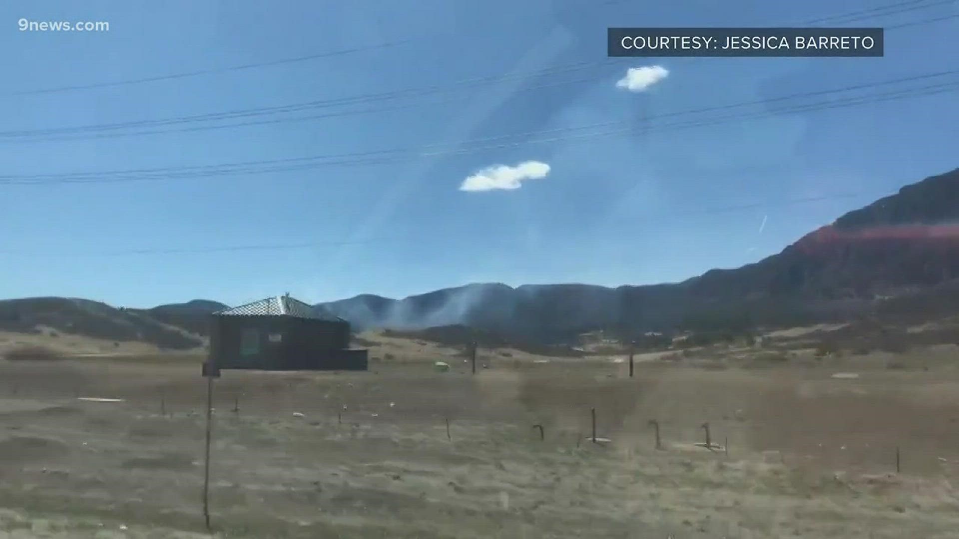 A 2.8-acre wildfire that was burning south of Colorado Springs on Sunday is contained.