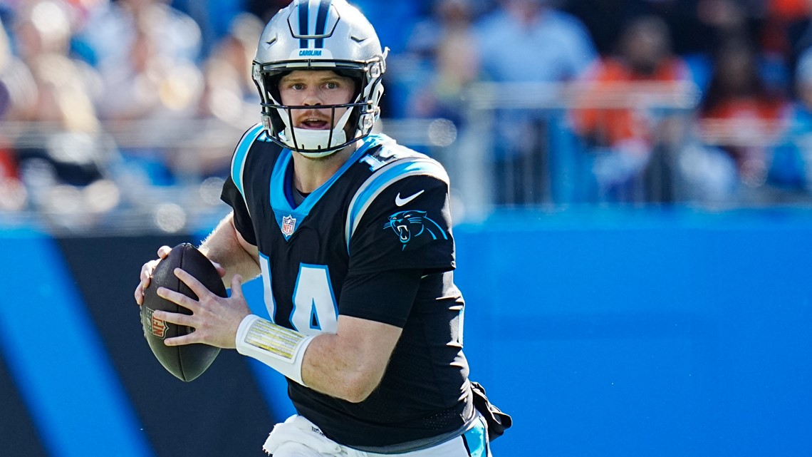 Carolina Panthers quarterback Sam Darnold (14) throws during an NFL  football game between the Carolina Panthers and the Denver Broncos on  Sunday, Nov. 27, 2022, in Charlotte, N.C. (AP Photo/Jacob Kupferman Stock