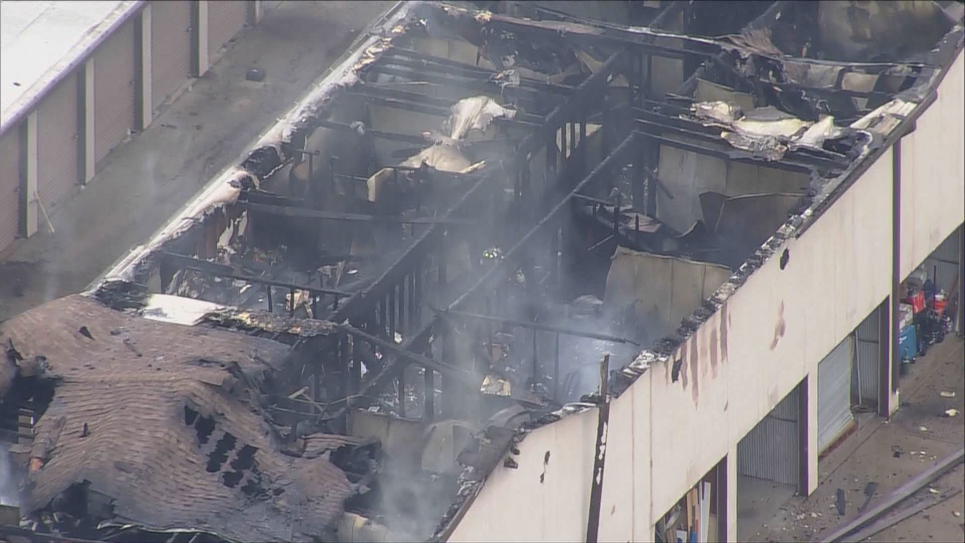 2 firefighters injured battling storage unit fire in Arvada | 9news.com