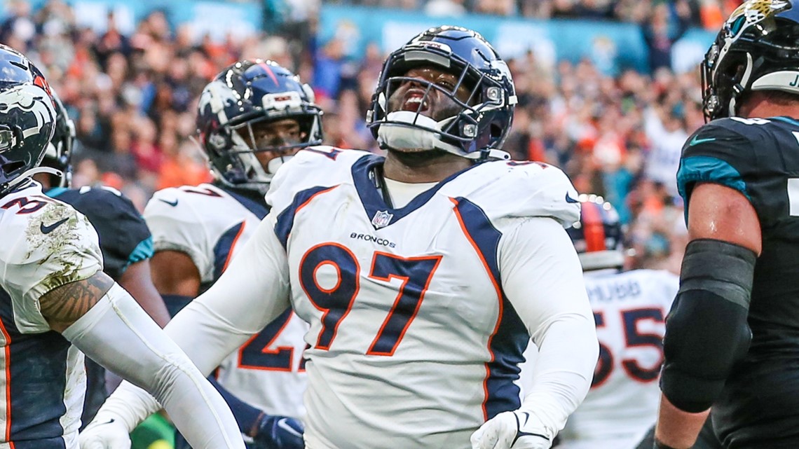 Denver, USA. October 23, 2022: Denver Broncos defensive end Dre'Mont Jones  (93) waits a for a replay review in the first half of the football game  between the Denver Broncos and New