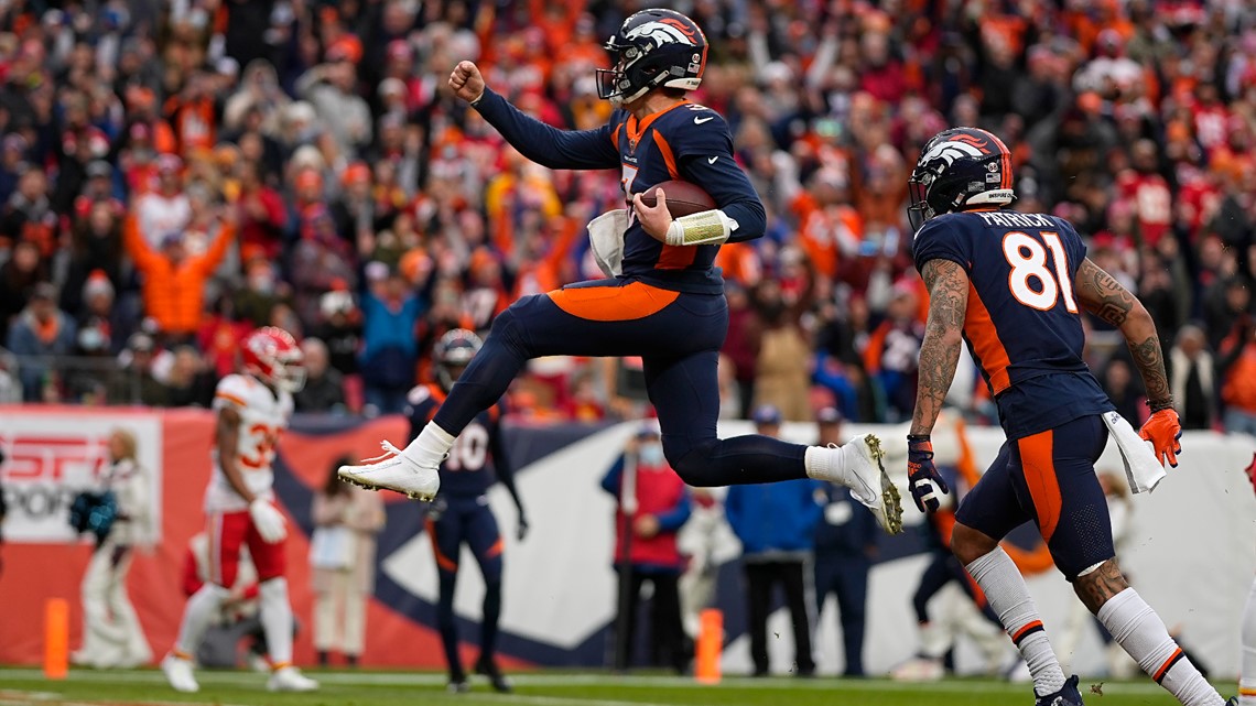 Denver Bronco fans cheer during the NFL football game between the Kansas  City Chiefs and the Denver Broncos at Arrowhead Stadium in Kansas City,  Missouri. The Broncos beat the Chiefs 44-13. (Credit