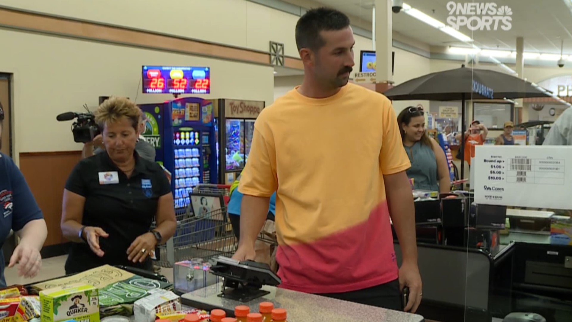 Denver Broncos kicker Brandon McManus helped students shop for school and pantry supplies.