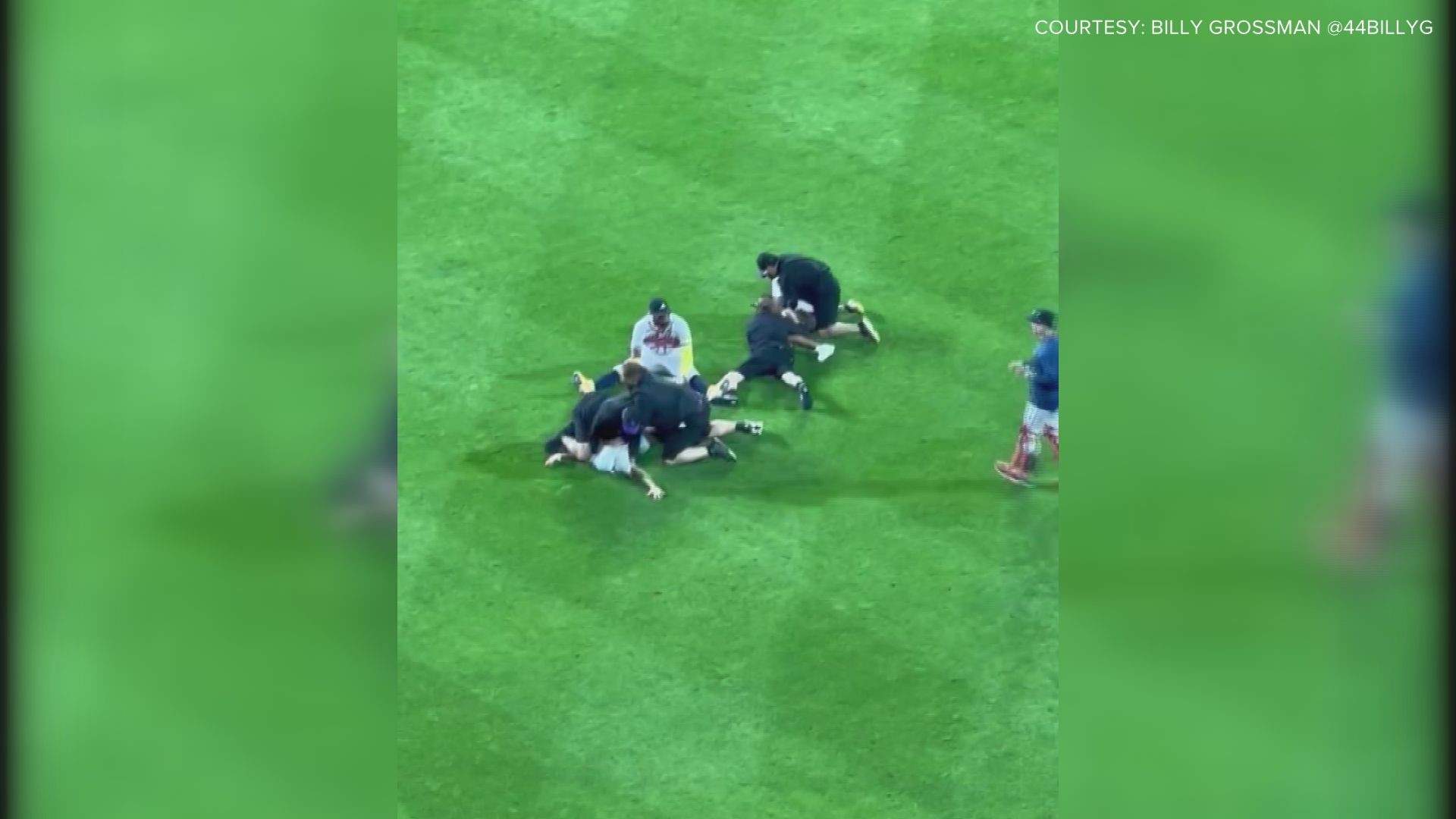 WATCH: Ronald Acuña Jr. Knocked To Ground by Fans Who Stormed Field During  Game