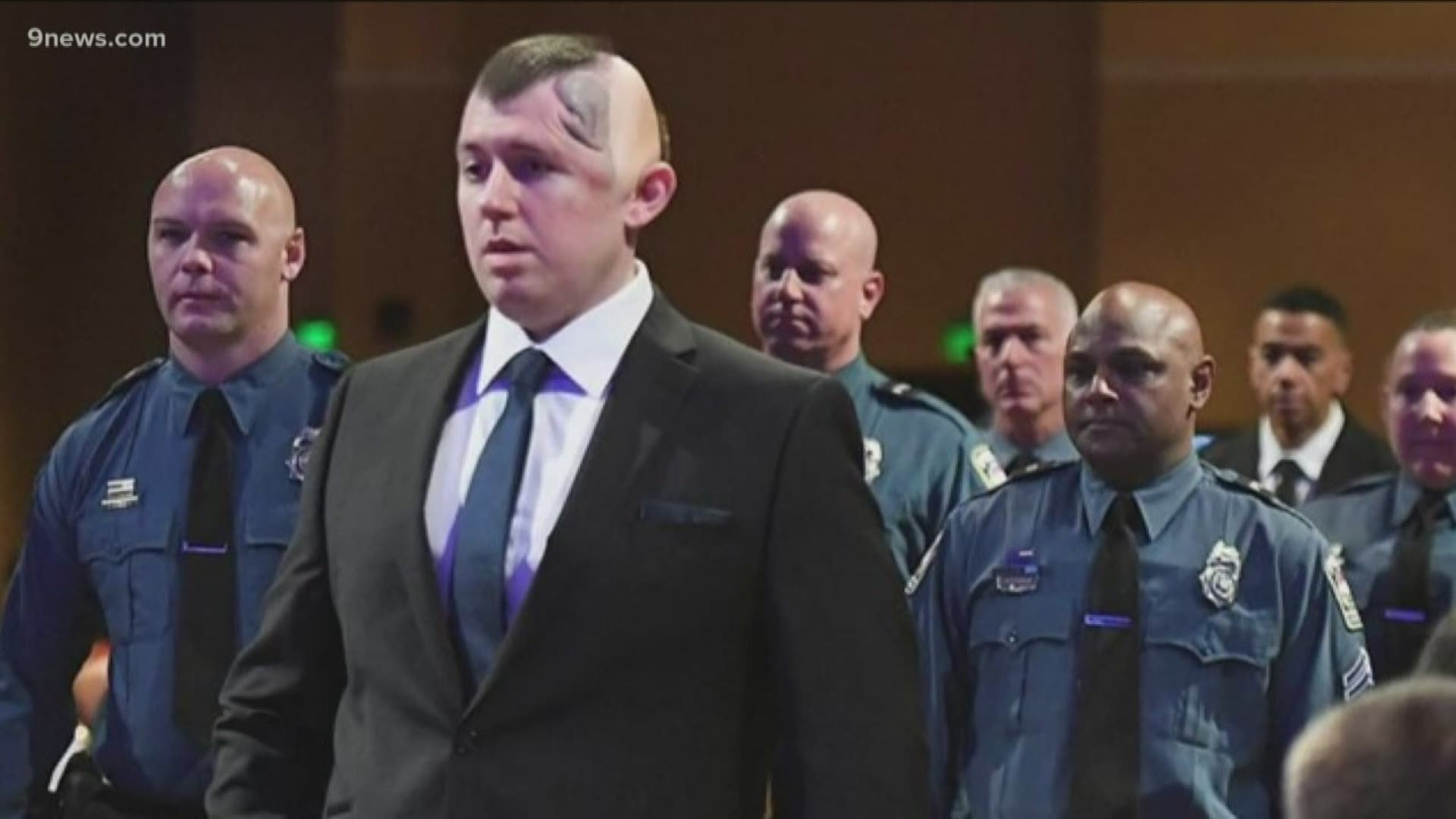 Colorado Springs police officer Cem Duzel led the procession of 31 fellow award recipients and received the Medal of Honor and the Purple Heart.