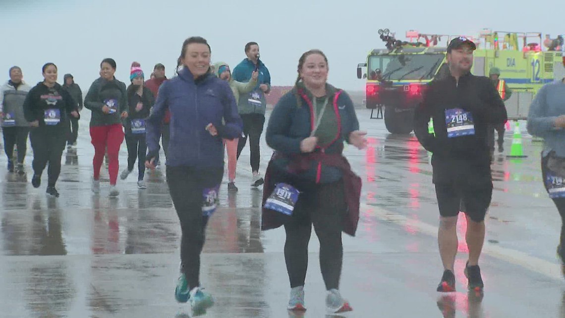 Thousands brave the elements for 5K on the Runway at DIA