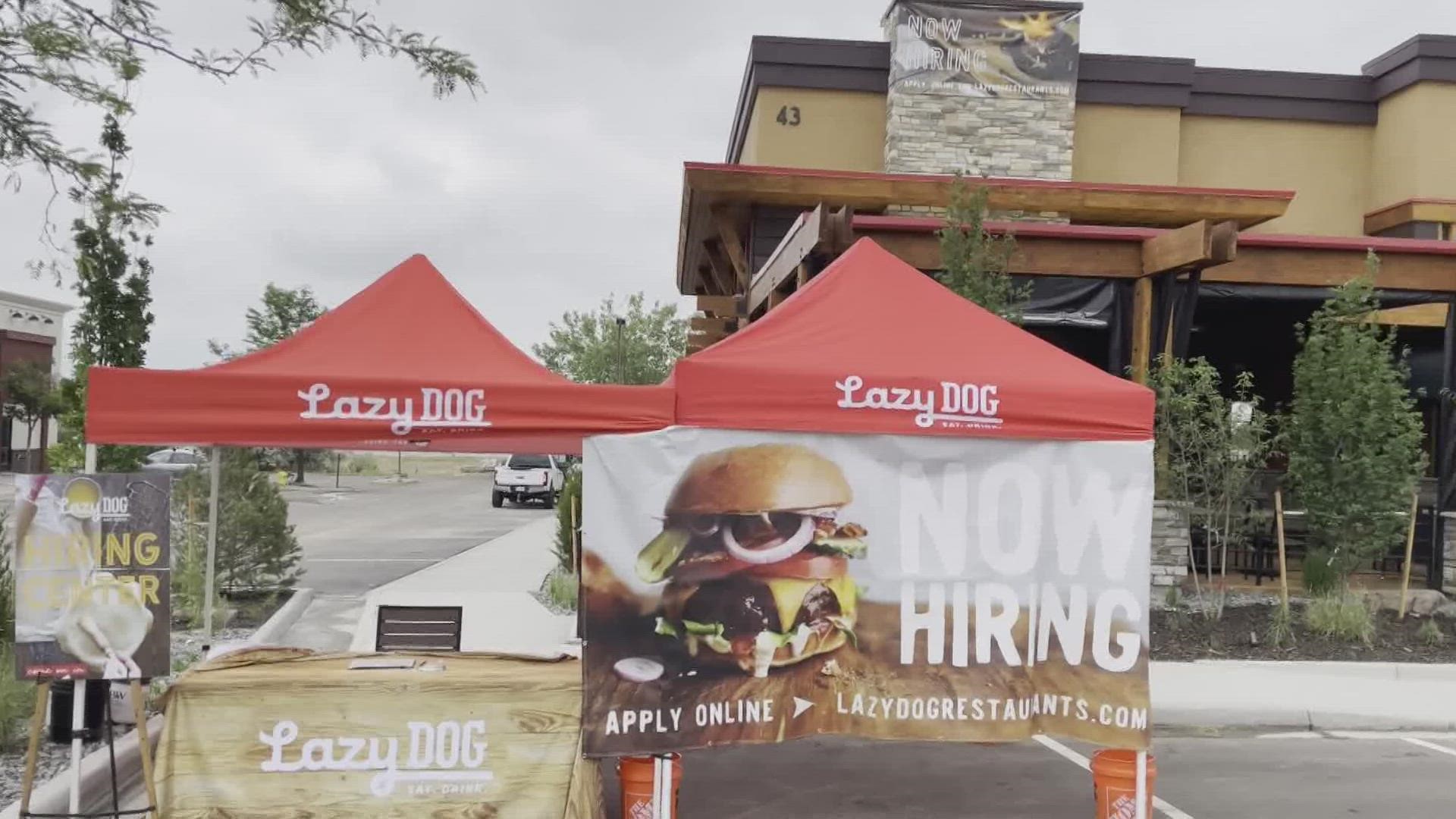 Ryan Frazier talks with Brian Palko, regional operations director, of Lazy Dog Restaurant and Bar about their plans to open their newest location in Highlands Ranch.