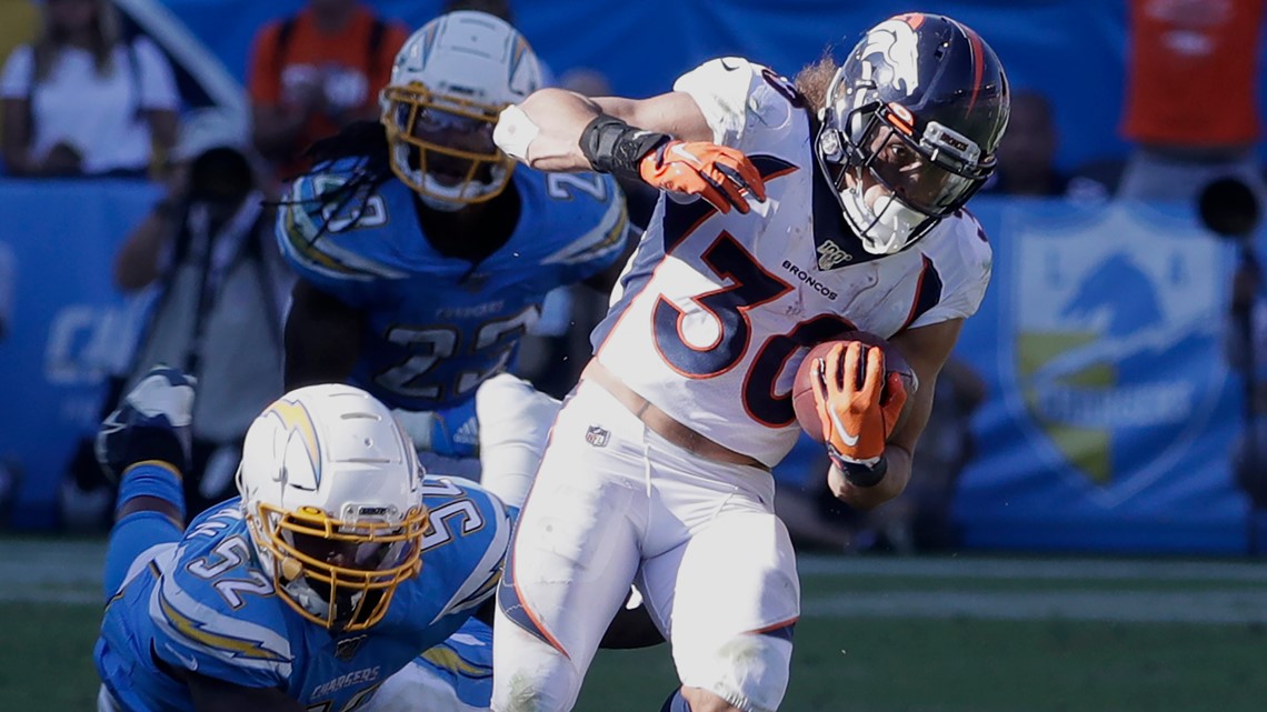 Denver Broncos running back Phillip Lindsay (30) takes part in drills  during the opening day of the team's NFL football training camp Thursday,  July 18, 2019, in Englewood, Colo. (AP Photo/David Zalubowski