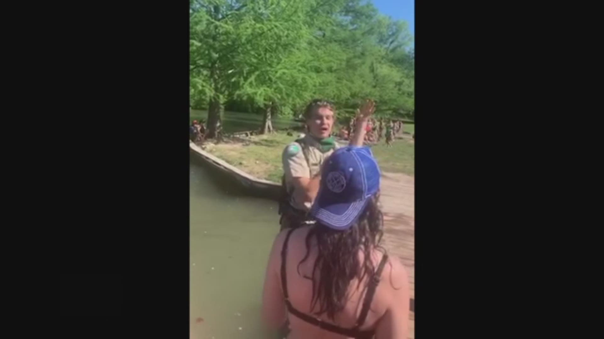 A man has been arrested after he allegedly pushed a park ranger into Lake Austin