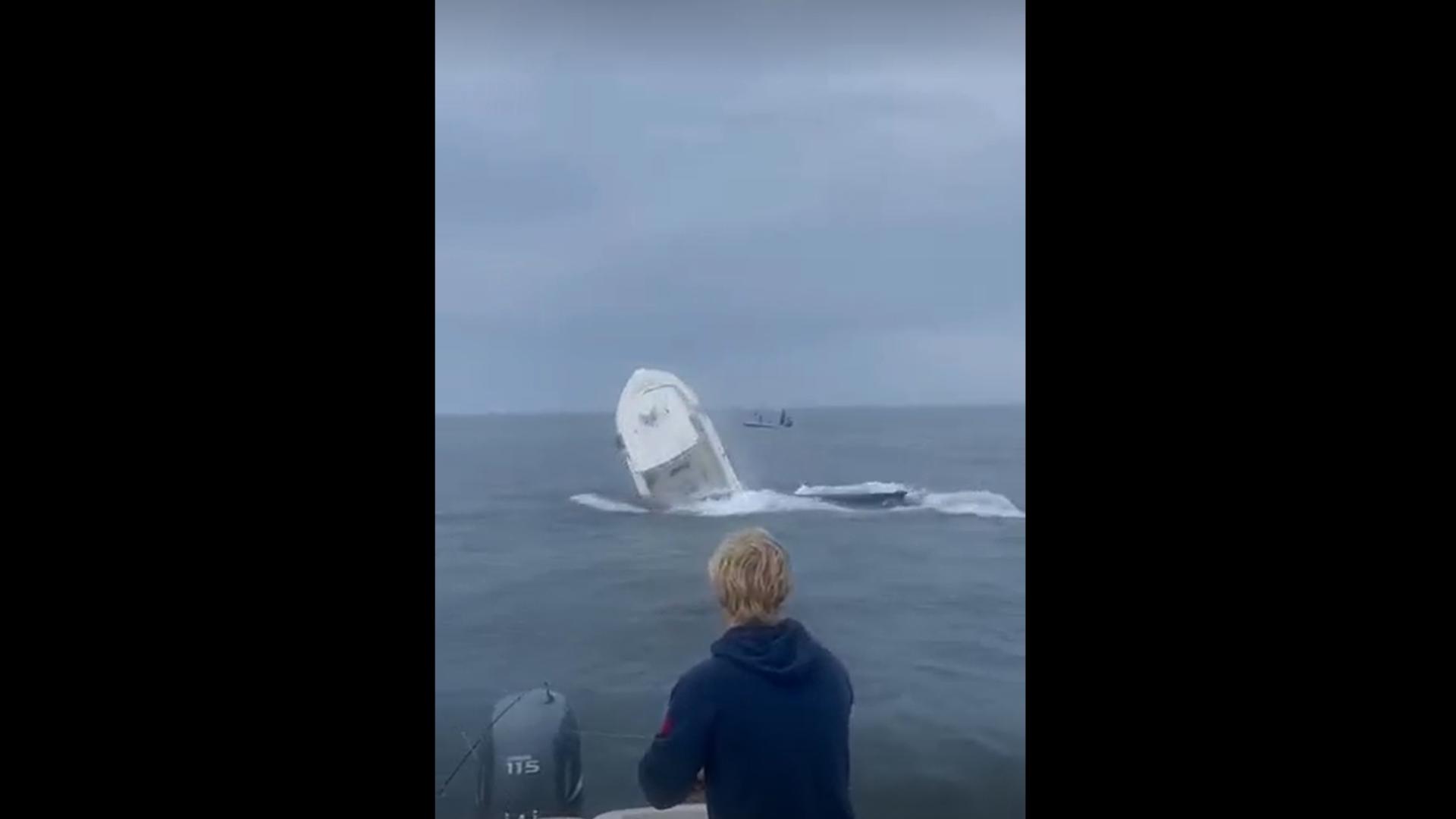 Credit: Wyatt and Cal Yager — Two people were thrown from the boat and rescued by a good Samaritan, U.S. Coast Guard officials said.