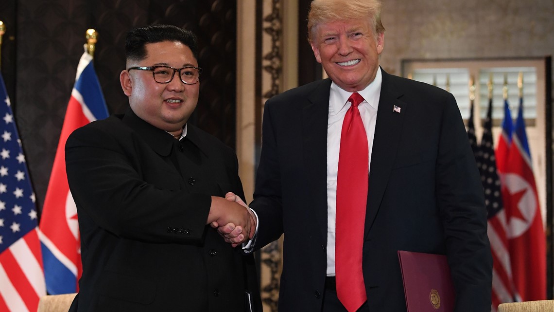 PHOTOS: President Trump and Kim Jong Un meet at historic summit | 9news.com
