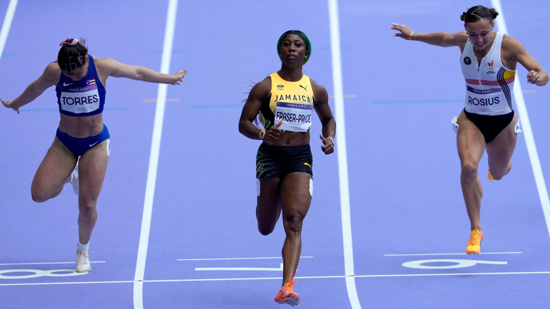 Why did ShellyAnn FraserPryce withdraw from the 100M?