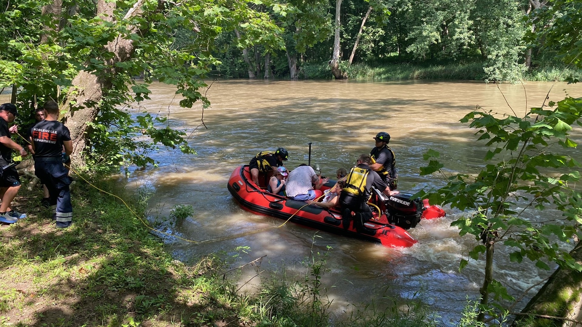 The Noblesville Fire Department rescue rafters and kayakers from the White River on Sunday, July 18, 2021.