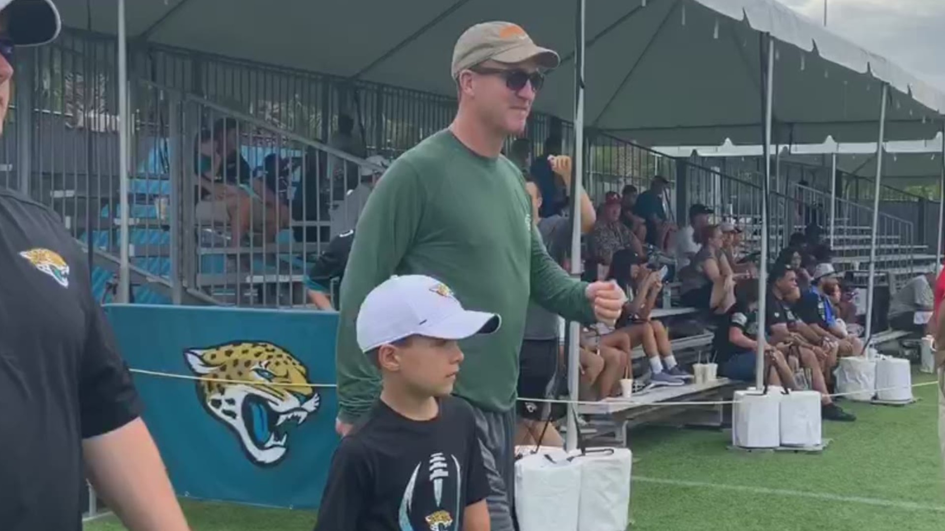 On Thursday, Tom Coughlin escorted him inside the Jaguars practice facility with Manning's son in tow.