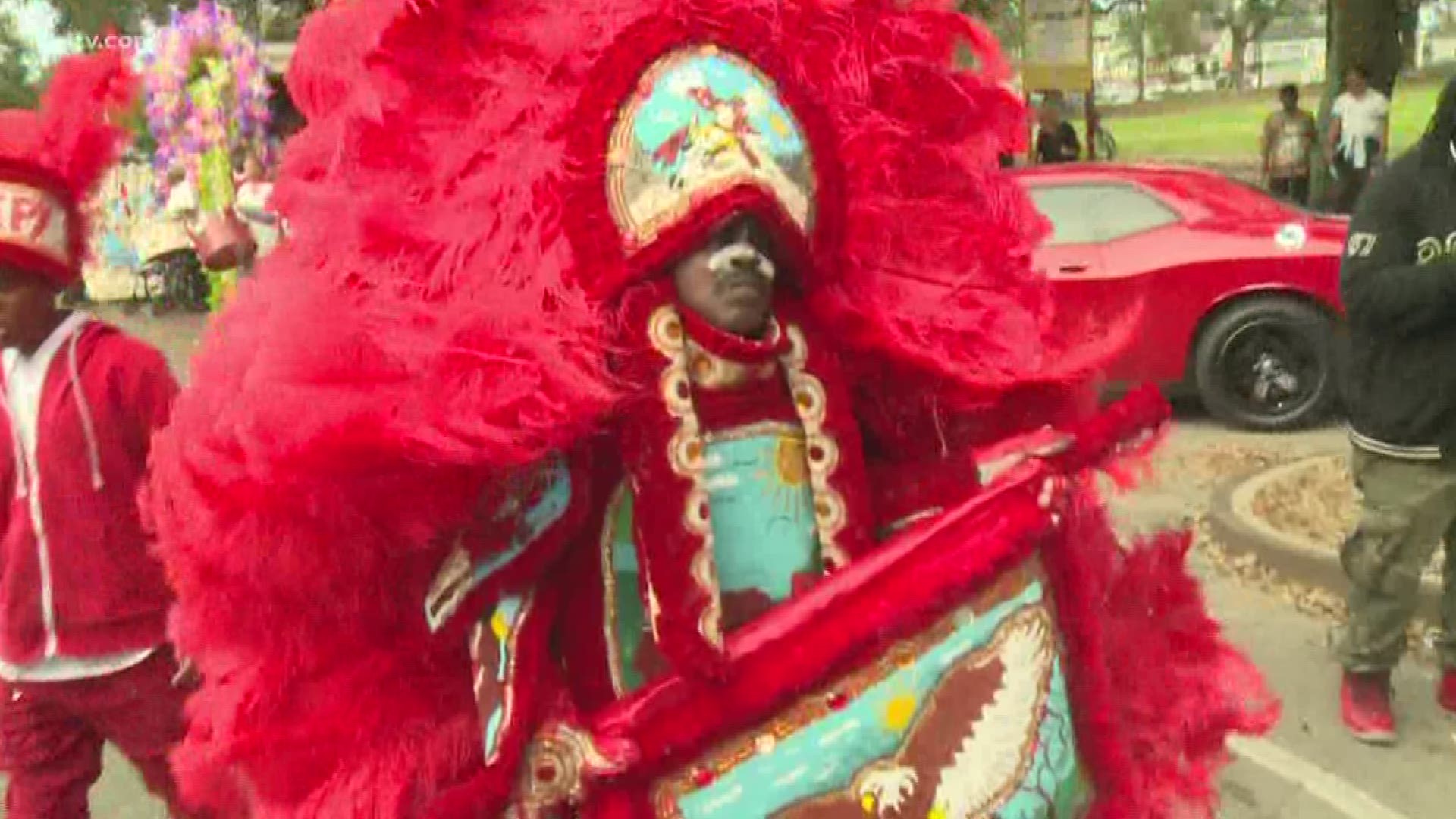 The Mardi Gras Indians, captured in action under the Claiborne Avenue bridge. 